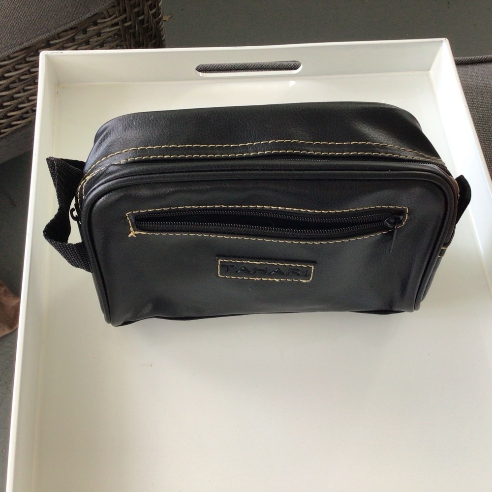 Man’s black travel case